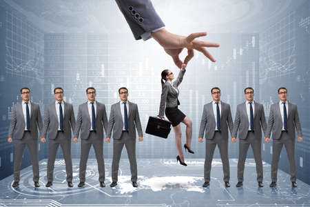 Recruitment concept with hand picking employeeの写真素材