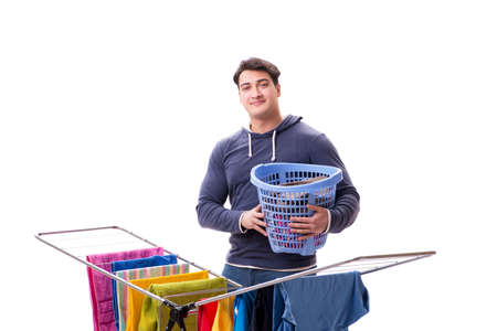 Husband man doing laundry isolated on whiteの写真素材