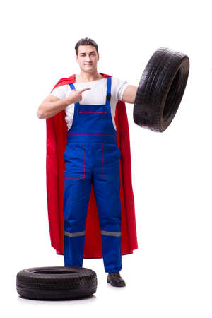 Superhero man with tyre isolated white backgroundの写真素材