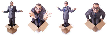 Man in thinking outside the box conceptの写真素材