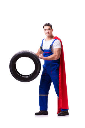 Superhero man with tyre isolated white backgroundの写真素材