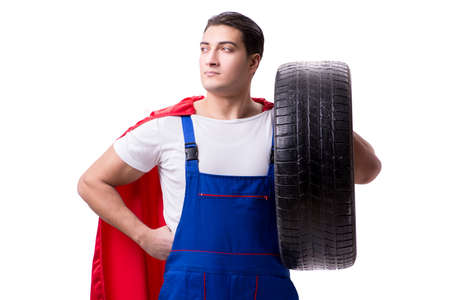 Superhero man with tyre isolated white backgroundの写真素材
