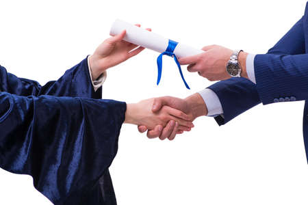 Student receiving diploma after graduationの写真素材