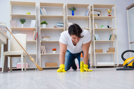 Man doing cleaning at homeの写真素材