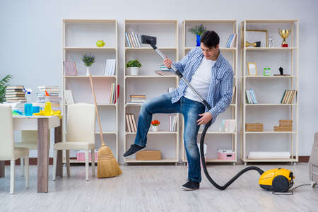 Man doing cleaning at homeの写真素材