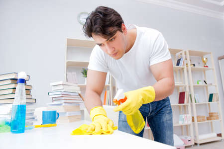 Man doing cleaning at homeの写真素材