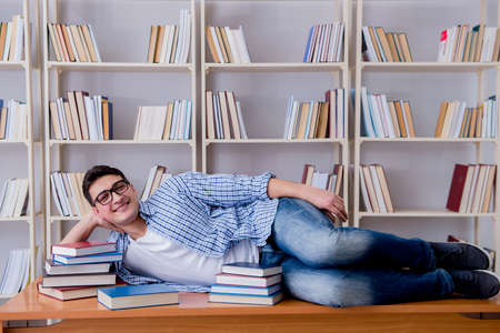 Young student taking break and falling asleepの写真素材