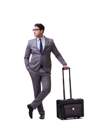Young man during business travel isolated on whiteの写真素材