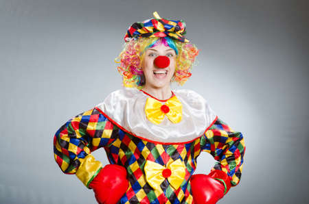 Funny clown in comical concept