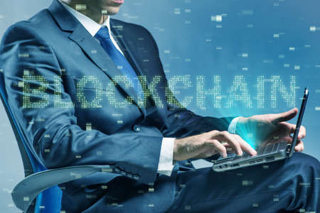 Businessman in blockchain cryptocurrency conceptの写真素材