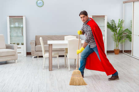 Super hero cleaner working at homeの写真素材