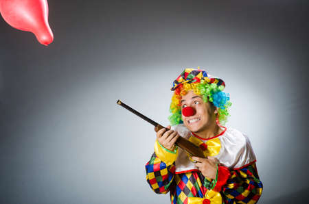Funny clown in comical conceptの写真素材