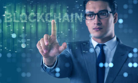 Businessman in blockchain cryptocurrency conceptの写真素材