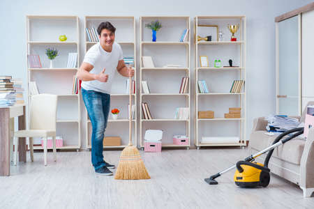 Man doing cleaning at homeの写真素材