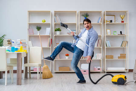 Man doing cleaning at homeの写真素材