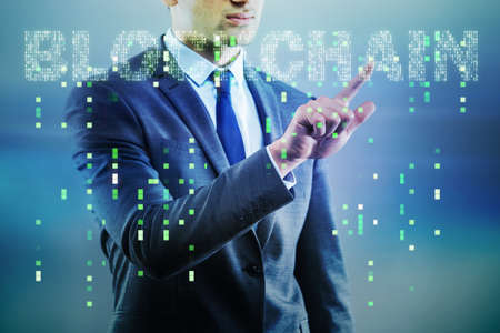 Businessman in blockchain cryptocurrency conceptの写真素材