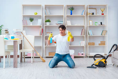 Man doing cleaning at homeの写真素材