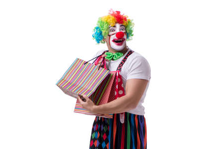 Funny clown after shopping bags isolated on white background
