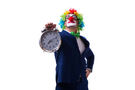 Funny clown businessman with an alarm clock isolated on white baの写真素材
