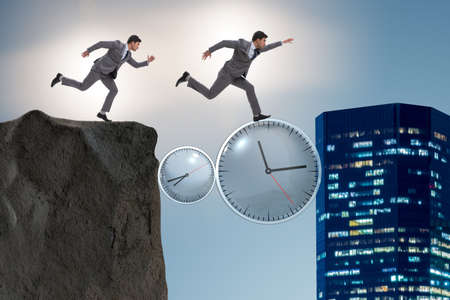Time management concept with business peopleの写真素材