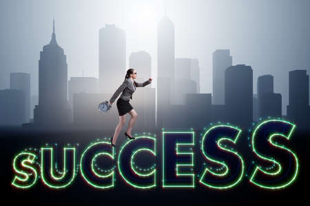 Businesswoman in success business conceptの写真素材
