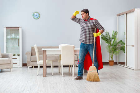 Super hero cleaner working at homeの写真素材