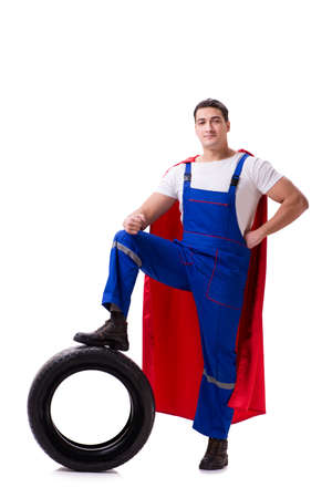 Superhero man with tyre isolated white backgroundの写真素材
