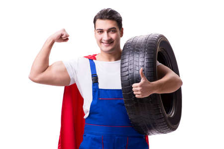 Superhero man with tyre isolated white backgroundの写真素材