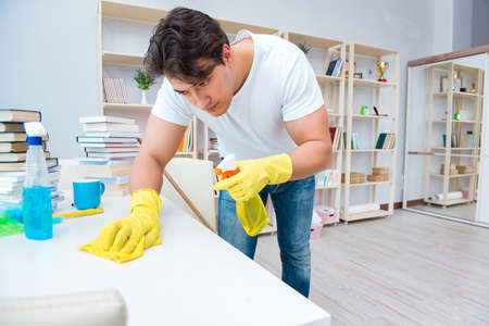 Man doing cleaning at home