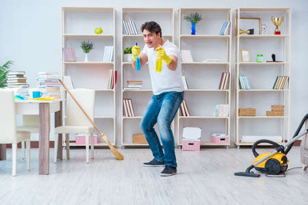 Man doing cleaning at homeの写真素材