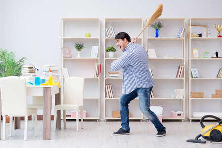 Man doing cleaning at homeの写真素材