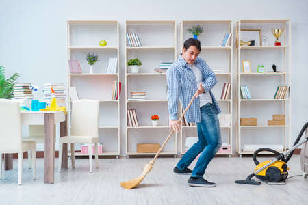 Man doing cleaning at homeの写真素材