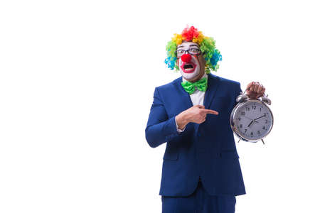 Funny clown businessman with an alarm clock isolated on white baの写真素材