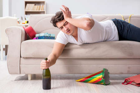 Young man after the wild Christmas party