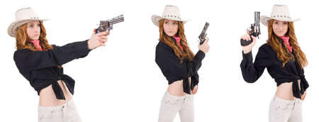Young cowgirl with handgun isolated on whiteの写真素材