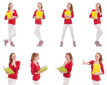 Young student with books on whiteの写真素材