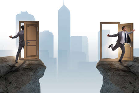 Businessman in teleportation concept with doors
