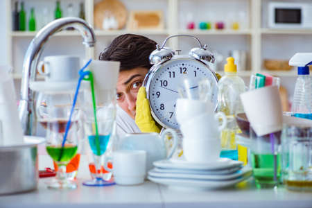 Man failing to meet the deadlines of housekeeping jobの写真素材