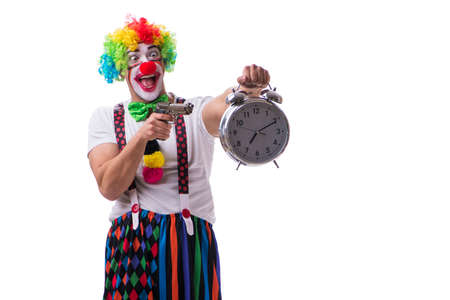Funny clown with an alarm clock isolated on white backgroundの写真素材