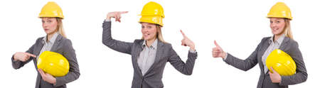 Businesswoman in gray suit and safety helmet isolated on whiteの写真素材