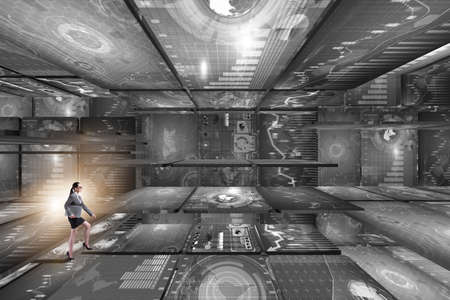 Businesswoman walking in data management conceptの写真素材