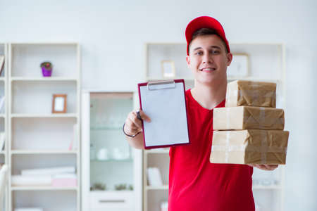 Post man delivering a parcel package