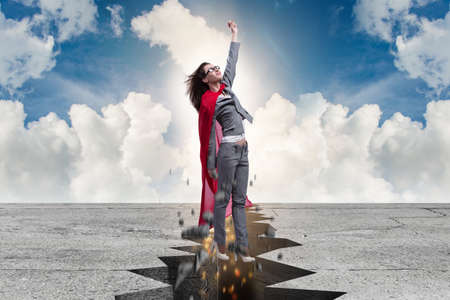 Superhero businesswoman escaping from difficult situation