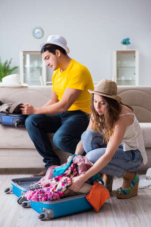 Young family preparing for travel vacationの写真素材