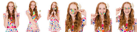 Pretty girl with lollypops isolated on whiteの写真素材