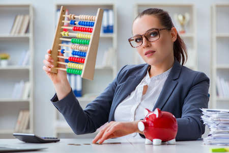 Businesswoman in pension savings conceptの写真素材
