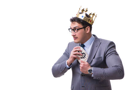 King businessman holding money bag isolated on white backgroundの写真素材