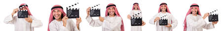 Arab man with movie clapper on whiteの写真素材