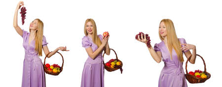 Woman with fruit basket isolated on whiteの写真素材
