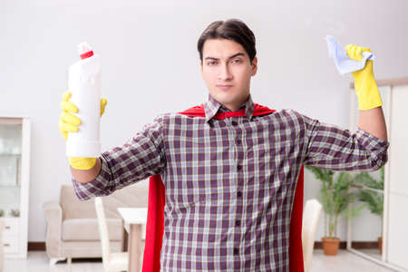 The super hero cleaner doing houseworkの写真素材